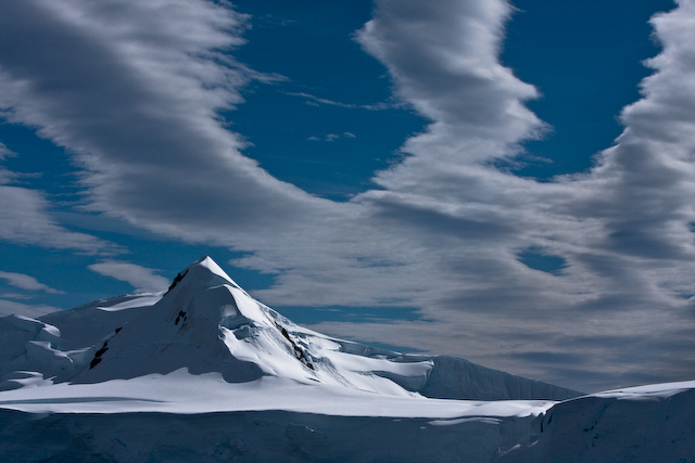 Clouds, mountains, and snow